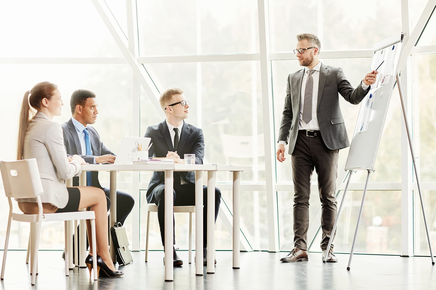Analyst giving a briefing to business leaders