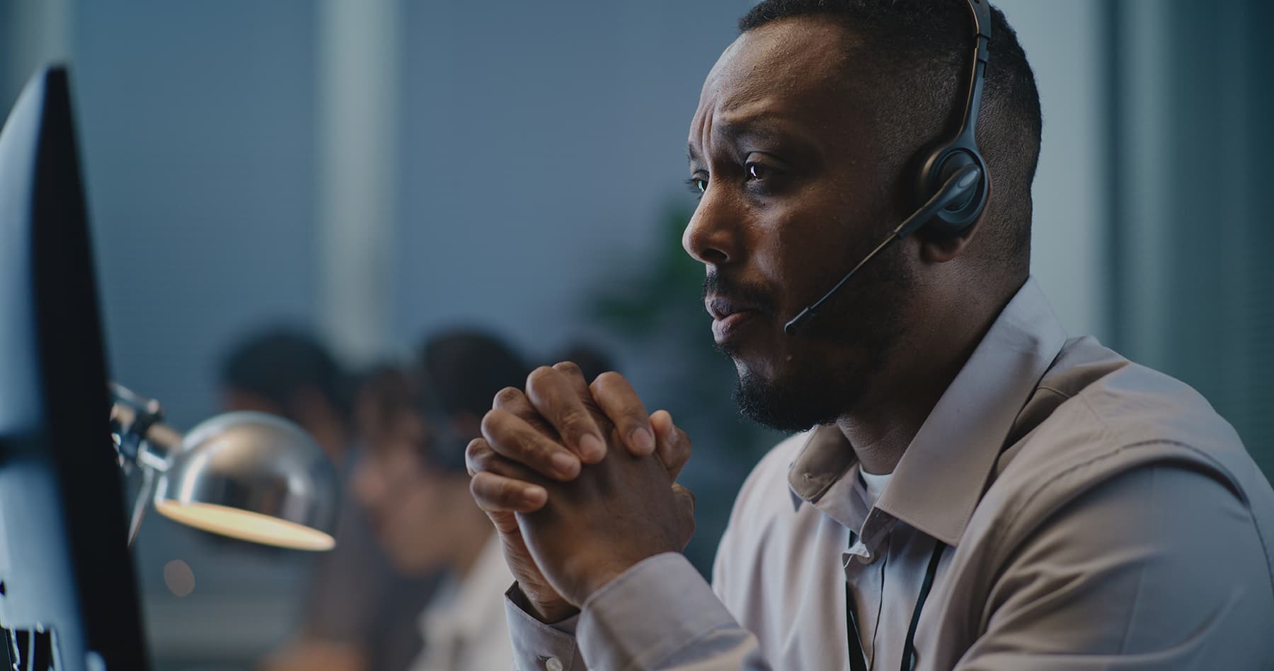 call center employee taking a phone call call center employee taking a phone call