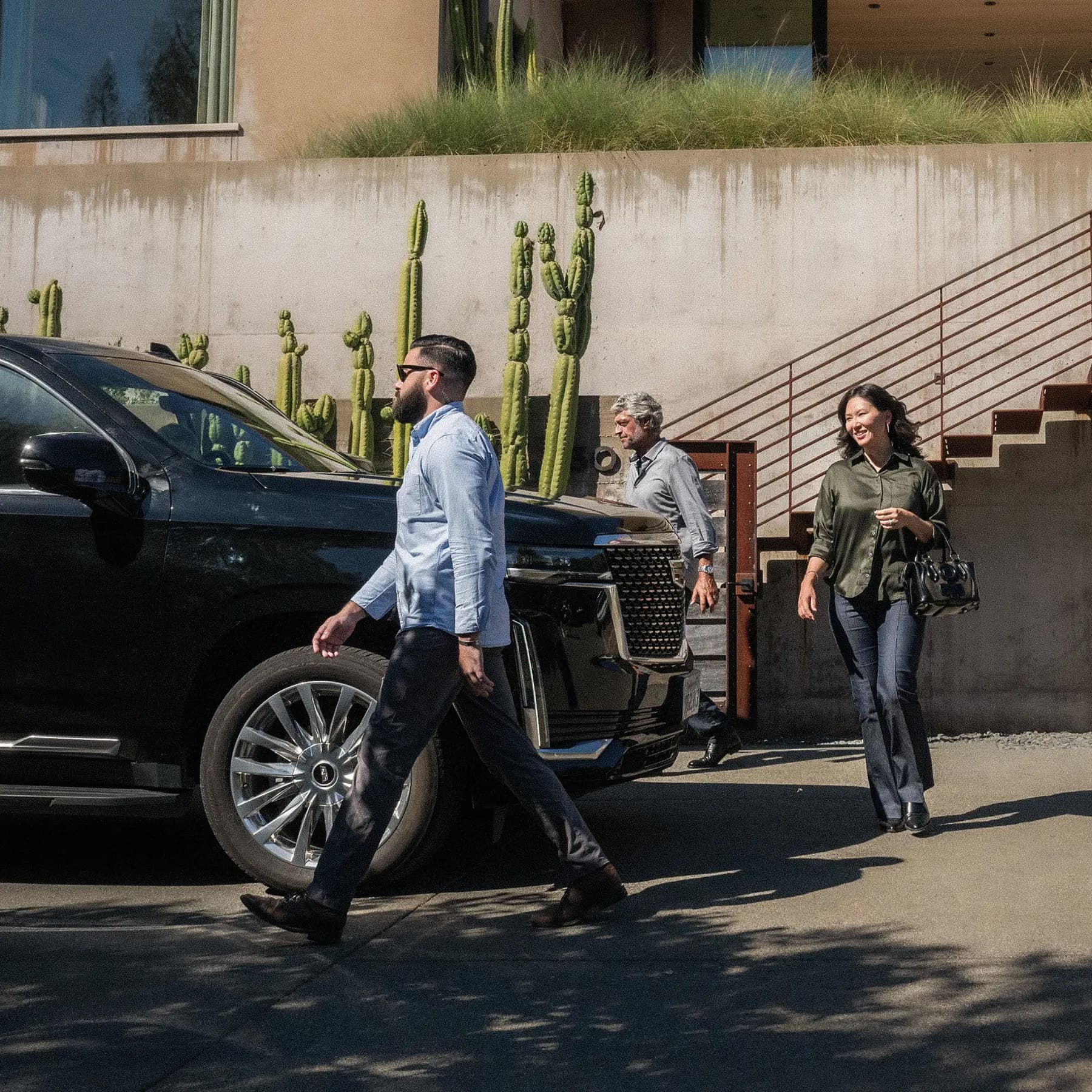 personal protection agent escorting client from building to vehicle personal protection agent escorting client from building to vehicle
