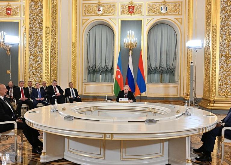 Armenian and Azerbaijani leaders sit around circular table to resolve the Nagorno-Karabakh question.